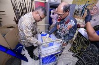 PROSES PEMBUKAAN PETI BESI DI REPOSITORI