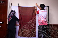 PENDOKUMENTASIAN KOLEKSI TEKSTIL BAGI PAMERAN ASEAN